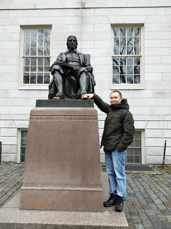 Guan with Harvard man